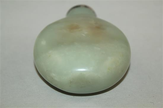 A Chinese pale celadon and russet jade snuff bottle, 6.5cm